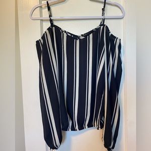 Blue and white striped blouse with tassels.
